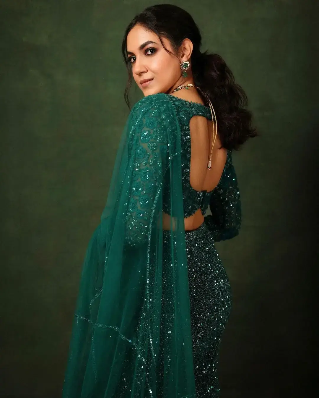 Actress Ritu Varma in Green Embroidered Lehenga Choli